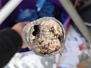 A clogged kitchen sink waste pipe