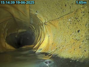 A defective drain lining