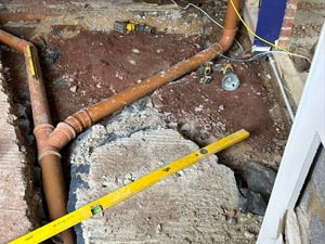 Additional drainage installation for a commercial property renovation in Ealing.