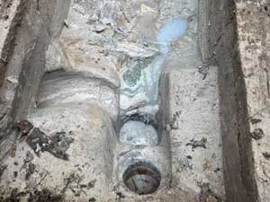 Builders waste causing a blocked drain.