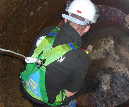 Pro Drain Engineer Clearing Drain