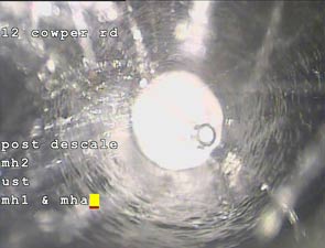 Cast Iron drain de-scale in Ealing.