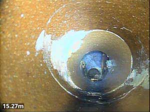 Fractures & Surface Damage within a Drain that can be repaired with a Patch Lining.