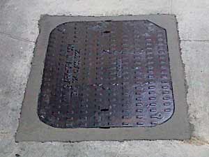 Recently Fitted Manhole Cover Ensuring Safety and Access.