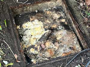 Some blocked manholes are covered but that's no problem for Pro Drain.